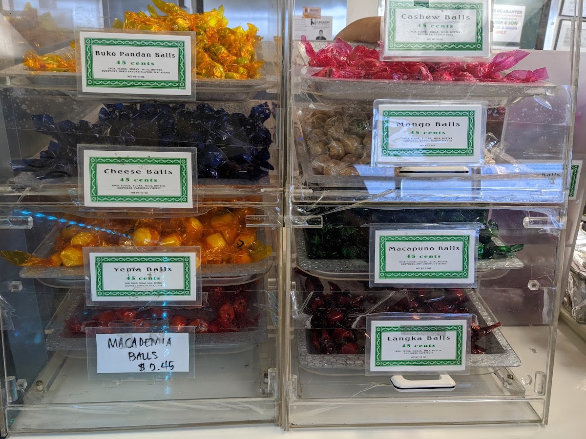 Clear cases of yema, macapuno, langka and buko pandan balls at 45 cents each