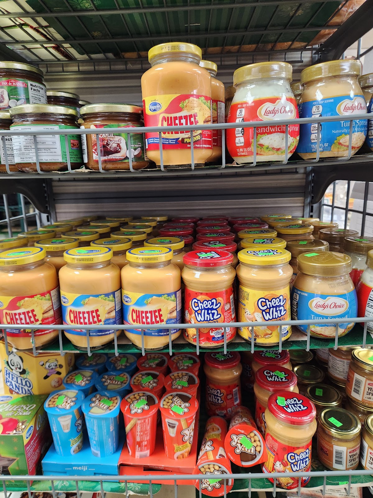 Packaged Filipino breads and snacks on the shop shelves